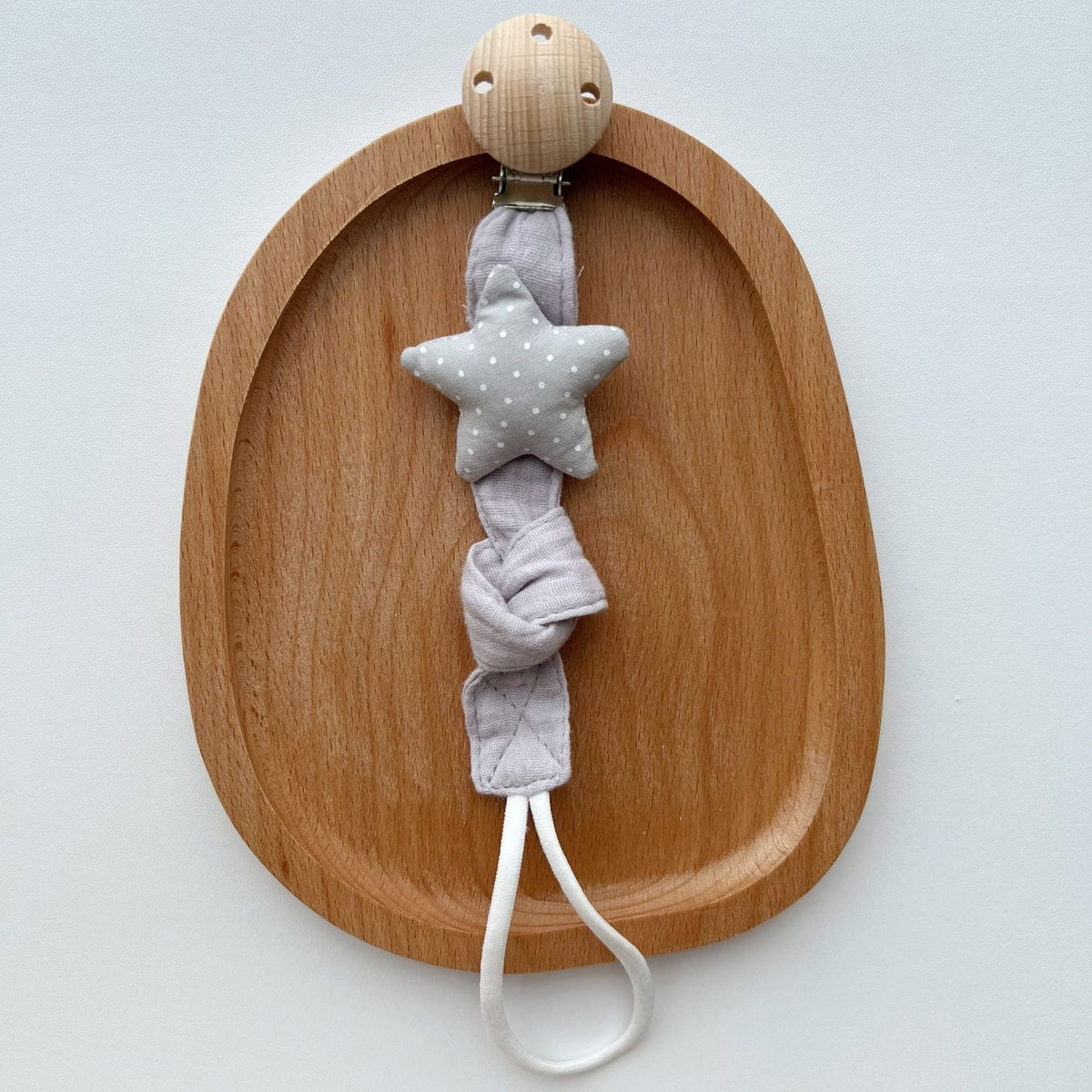 Cotton Dummy Clip, Knitted Soother Holder with Plush Motif & Beech Wood Clip, 27 cm, 8 Designs, styled on a shelf