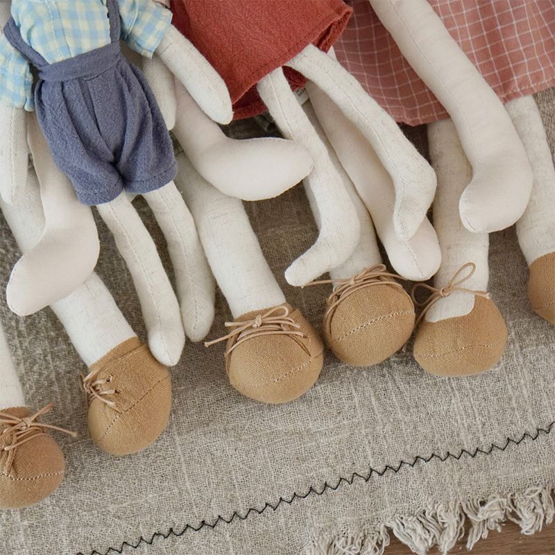 Bunny Doll with Long Legs, Fabric Rabbit in a Pinafore, 22 cm, Ages 0, 3, styled on a shelf