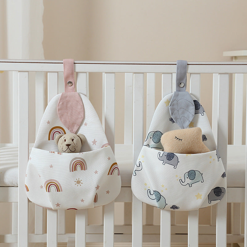 Leaf Nursery Organiser, Washable Cot Storage Bag, styled in a nursery setting