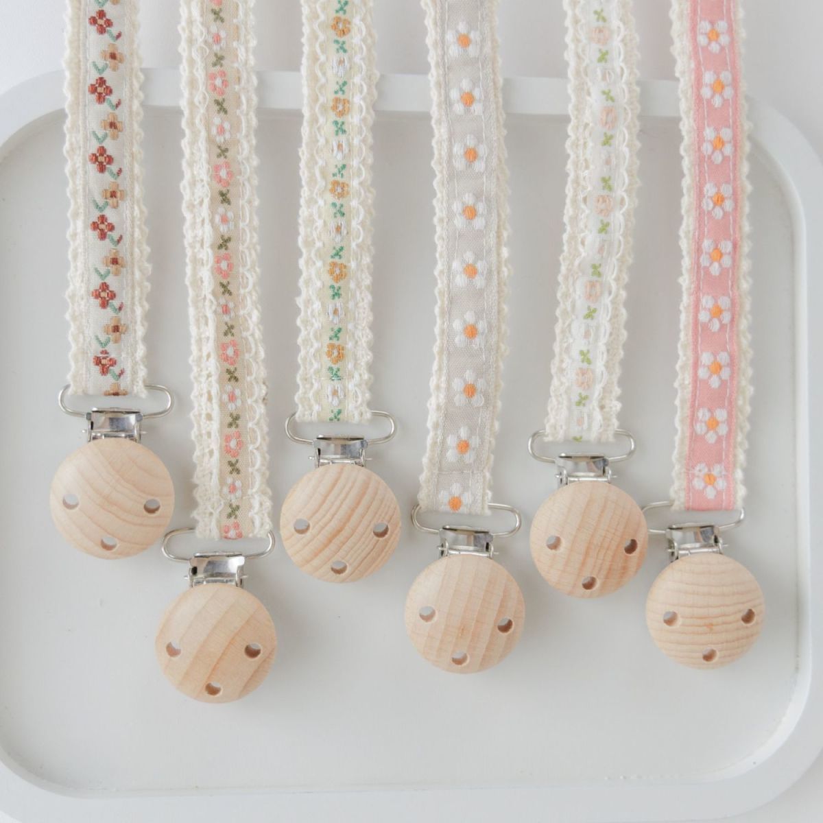 Floral Ribbon Dummy Clip, Lace Edge Soother Holder with Beech Wood Clip, 28.5 cm, 7 Designs, styled with props