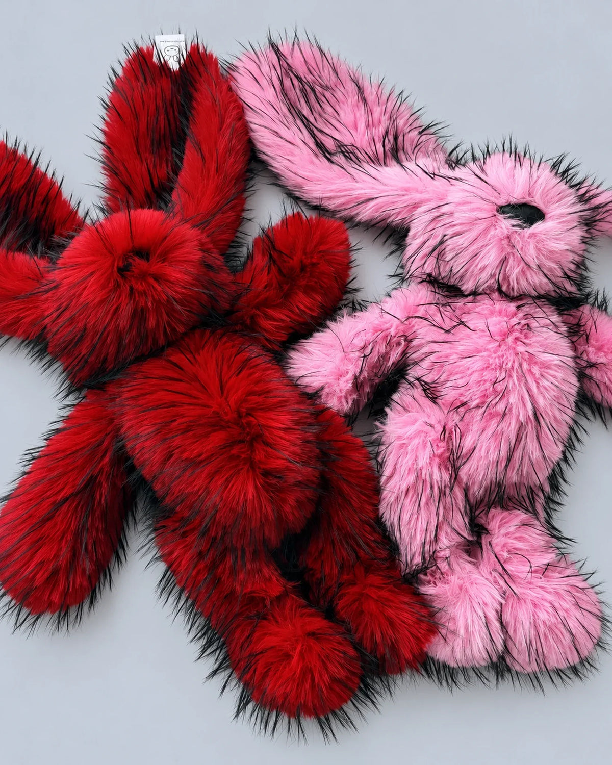 Cherry Red and Rose Pink 45cm faux fur bunny plush toys, close-up