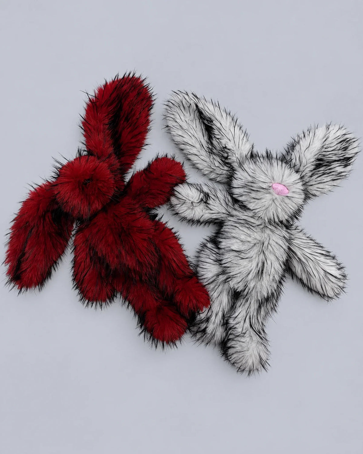 Cherry Red and Arctic White 45cm faux fur bunny plush toys, flat lay